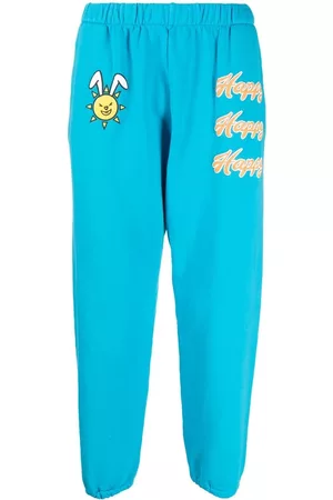 Natasha Zinko Pantalones de chándal con estampado Happy