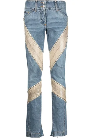 Dolce & Gabbana Vaqueros slim con panel de piel de serpiente 2000