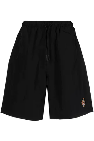 MARCELO BURLON Bermudas con logo bordado