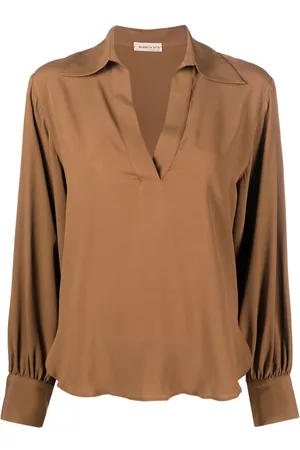 BLANCA Blusa drapeada con cuello en V