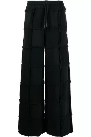 MARCELO BURLON Pantalones con cordones y diseño del revés