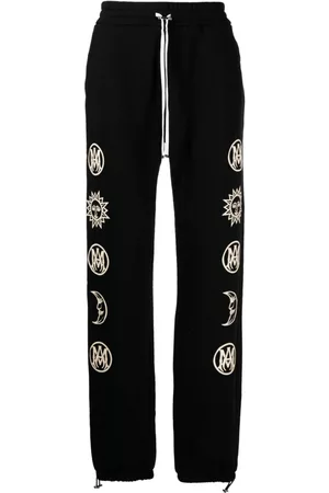 AMIRI Pantalones con estampado gráfico