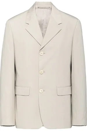 Prada Blazer con botones y logo triangular