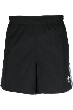 adidas Pantalones cortos de running con rayas laterales