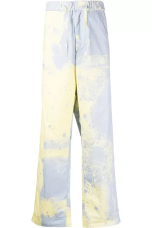 OAMC Pantalones rectos con motivo en espray