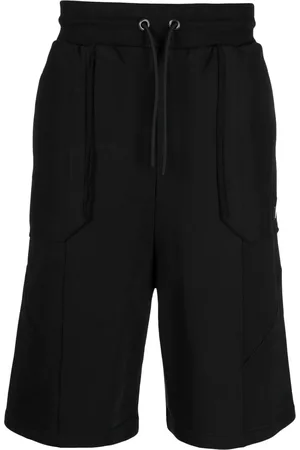 A-cold-wall* Bermudas con parche del logo