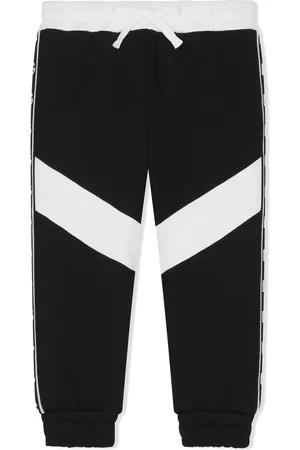 Dolce & Gabbana Pantalones de chándal con franja del logo