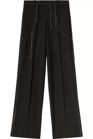 OFF-WHITE Pantalones con costuras en contraste
