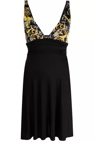 VERSACE Vestido corto con logo estampado