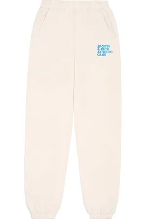 Sporty & Rich Pantalones de chándal con eslogan estampado