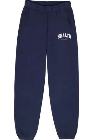 Sporty & Rich Pantalones de chándal Health Ivy con logo estampado