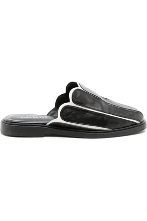 Studio Chofakian Mules con borde festoneado