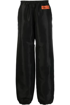 Heron Preston Pantalones anchos con parche del logo