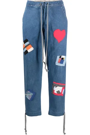 GREG LAUREN Vaqueros con detalle de parche