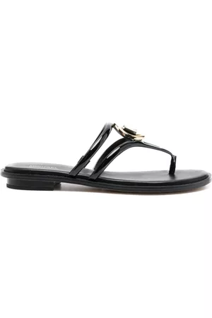 Michael Kors Sandalias con tira entre los dedos y placa del logo