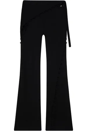 Courrèges Pantalones acampanados con aberturas