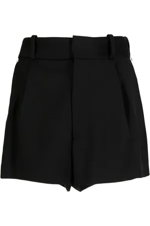 AREA Shorts con abertura y detalles