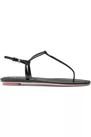 Prada Sandalias planas con tira entre los dedos