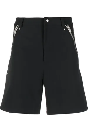HELIOT EMIL Pantalones con cremalleras laterales
