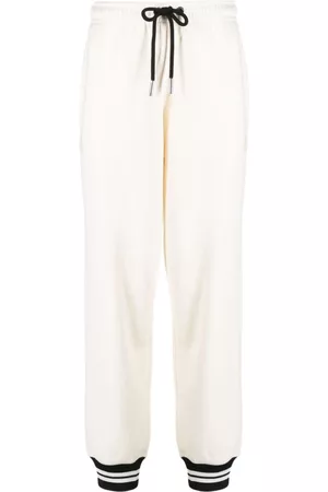 Moncler Pantalones de chándal con ribete a rayas