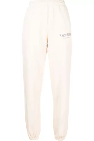 Sporty & Rich Pantalones elásticos con logo estampado