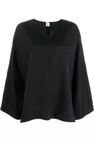 By Malene Birger Blusa con abertura en las mangas