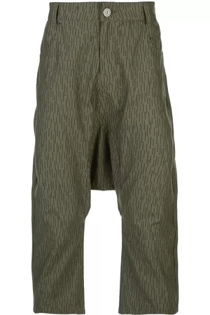 MOSTLY HEARD RARELY SEEN Pantalones con estampado gráfico