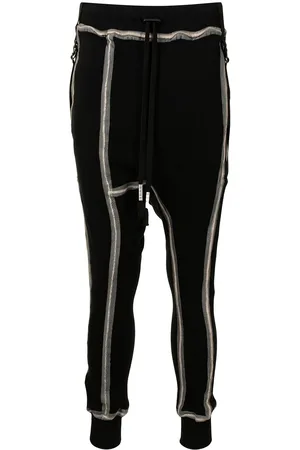 11 BY BORIS BIDJAN SABERI Pantalones con detalle de costuras