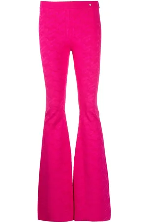 VERSACE Pantalones acampanados con motivo La Greca