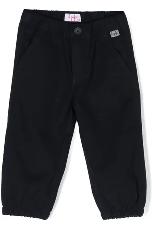 Il gufo Pantalones con parche del logo