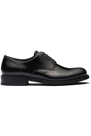Prada Zapatos Derby con logo en relieve