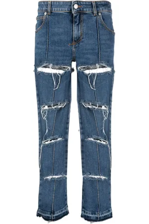 Alexander McQueen Vaqueros capri con efecto envejecido