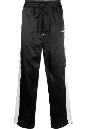 AMIRI Pantalones anchos con raya lateral