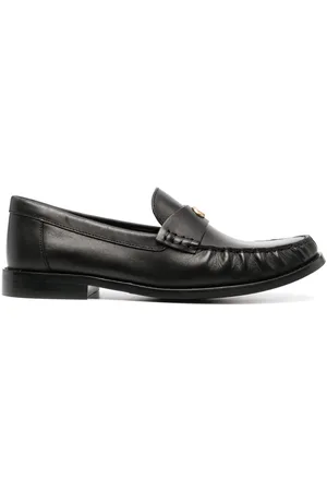 Coach Mocasines con placa del logo
