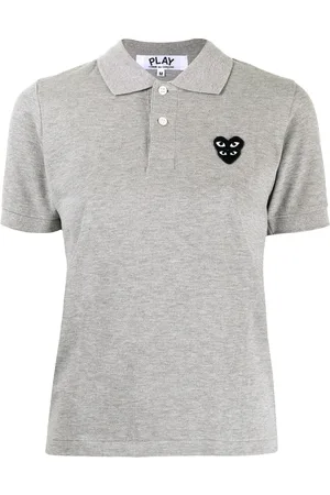 Comme des Garçons Polo con parche del logo