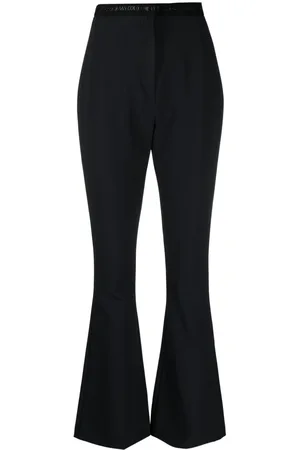 VERSACE Pantalones acampanados con logo en la cinturilla