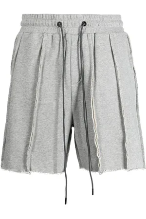 MOSTLY HEARD RARELY SEEN Pantalones cortos de deporte con costuras expuestas