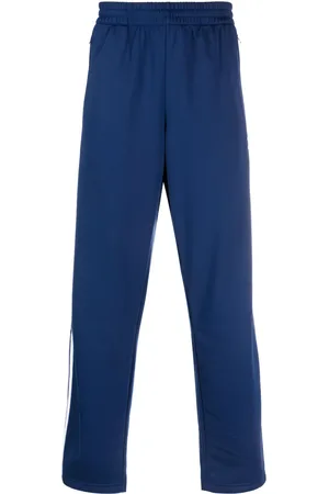 adidas Pantalones con tres rayas y logo