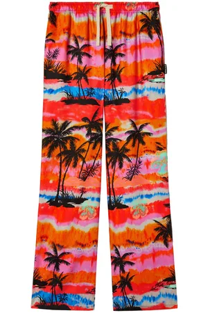 Palm Angels Pantalones anchos con estampado de palmeras