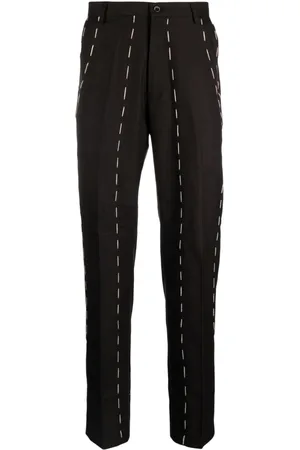 KIDSUPER STUDIOS Pantalones rectos con costuras en contraste