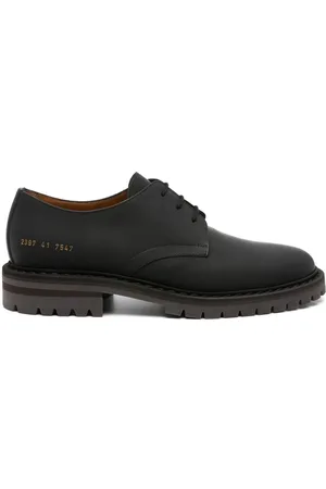 COMMON PROJECTS Zapatos derby con número de serie estampado