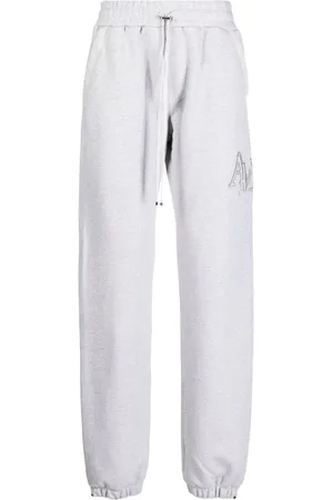 AMIRI Pantalones de chándal Staggered con logo bordado