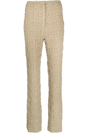 Nanushka Pantalones slim Juna de tejido seersucker