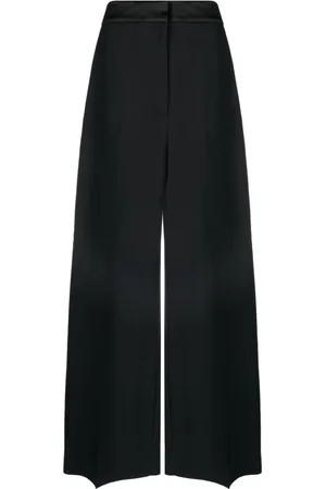 Khaite Pantalones palazzo de talle alto
