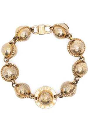 Céline Pulsera con charm de esfera 1990