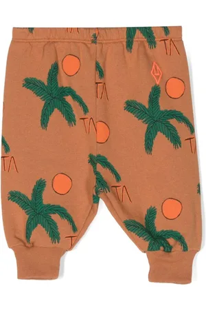 The Animals Observatory Pantalones Dromedary con palmeras estampadas