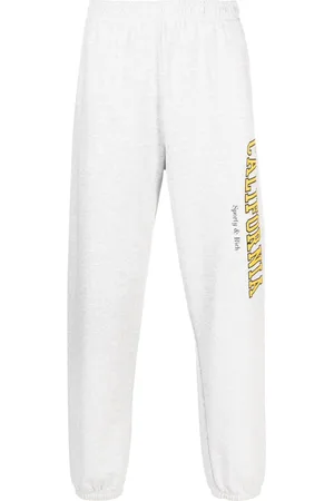Sporty & Rich Pantalones con texto estampado