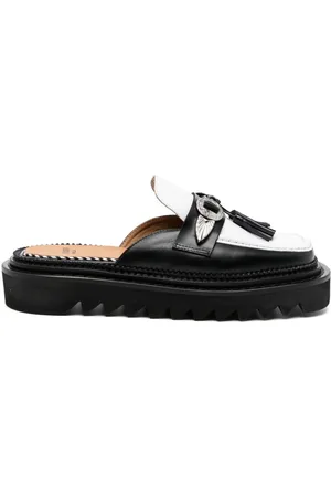 TOGA PULLA Mules con detalle de borlas