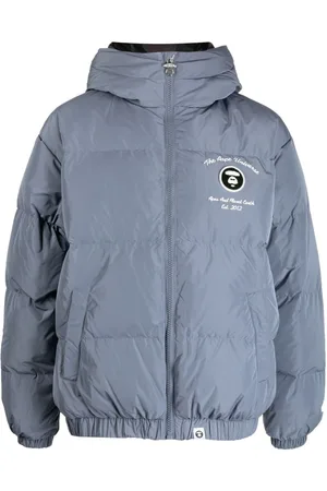 A Bathing Ape Plumífero con capucha y logo