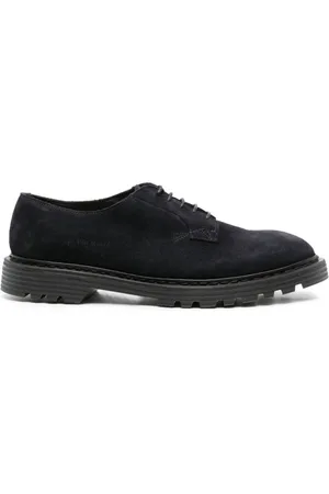 Premiata Zapatos derby con logo en relieve